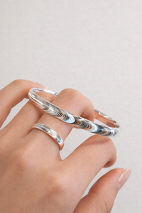 <tc>Armband Kattöga – En våg i rörelse</tc>